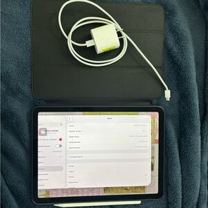 Apple iPad with Black Cover and White Charger